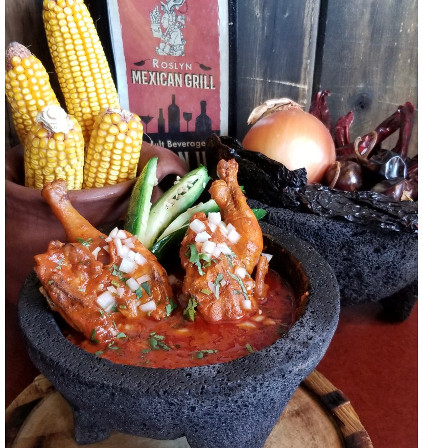Molcajete with chicken in red sauce